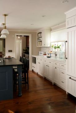 Designers say more&nbsp;homeowners are opting for wood floors in the kitchen.
