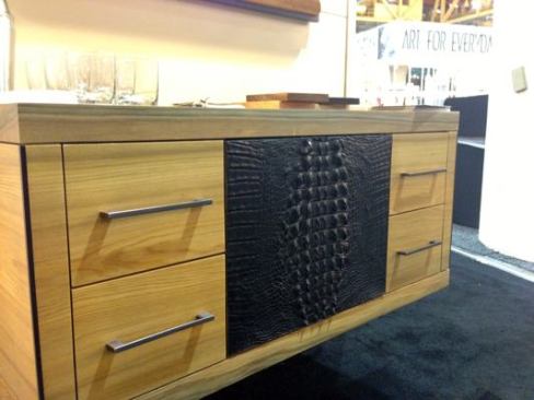 Try to Hide  In addition to its faux leather-wrapped vanity options, this Louisiana-based company offers a native spin on design with available alligator hide accents. The company says hides only come available in quantity a couple of times a year, so allow as much as 12 weeks of lead time for a piece like this wall-mounted sideboard. 
Gator Millworks | 225.667.7758 | gatormillworks.com