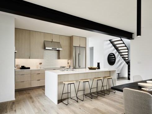 The 3,000-square-foot, two-story home features an open floor plan that connects directly to the outdoors.