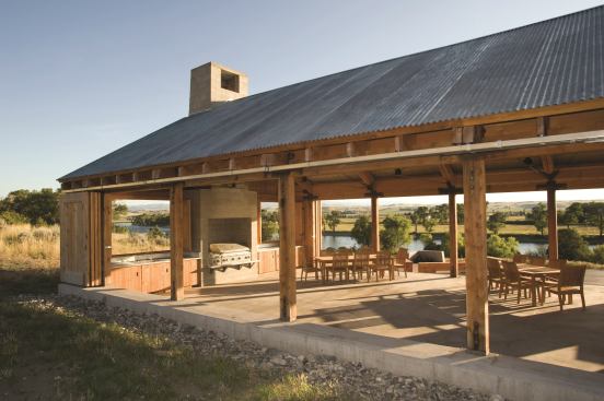 Rather than compete with its natural surroundings, which include a position on the Yellowstone River and views of the Rocky Mountains, this pavilion embraces them by stripping down to bare materials that allow it to blend in with the natural environs. A corrugated metal roof disguises a cable system that adds extra support, freeing up wall space for sliding doors that stack for optimal views. Project: Riverside Barbecue Pavilion, Big Timber, Mont.; Builder: On-Site Management, Bozeman, Mont.; Architect: Muse Architects, Bethesda, Md.