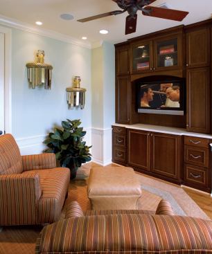 KID ZONE: The secondary bedrooms and master suite are separated by a TV and game area at the top of the stair landing—a semi-private hangout spot for kids and their friends.