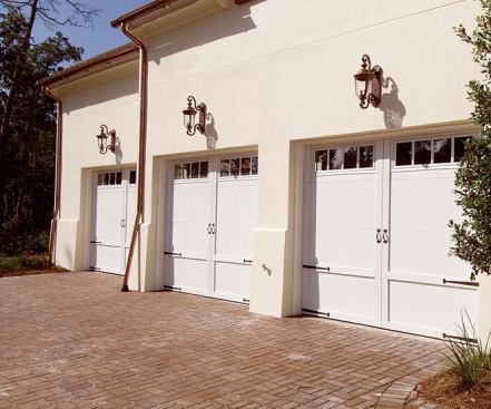 DOORS OF OPPORTUNITY: The house uses garage doors from Overhead Door Corp.'s Renaissance Collection. With an embossed grain texture, the custom doors look like wood but are made of steel. Polyurethane insulation provides an energy-efficient 12.76 R-value, while optional decorative hardware and window treatments allow personalization. The door is available in 18 designs. www.overheaddoor.com.
