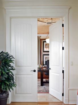 TALL TALES: The right interior door helps make a house feel special. The Reality House uses 8-foot and 6-foot 8-inch Cheyenne two-panel plank smooth doors from Masonite. Launched in honor of the company's 80th anniversary, the special-edition molded panel doors feature beaded planking and lines that mimic the stiles and rails on real wood doors. They also feature Safe 'N Sound solid core construction for noise control. www.masonite.com.