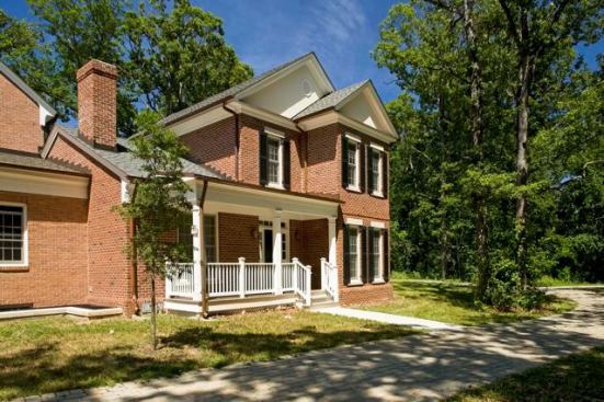 Even though the homes are new from the ground up, the architects retained more mature trees and landscaping than a conventionally sited home.