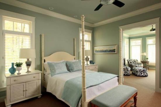 A sitting room off this first-floor master can be opened to the living room beyond, creating a "swing room" configuration.
