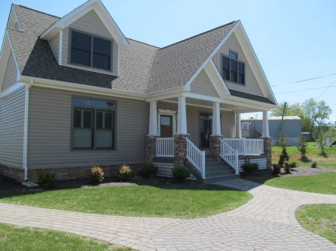 Down the road from Mod-U-Kraf’s factory in Virginia is its sales office complex, which includes three models and a design center. Pictured is a 2,084-square-foot Craftsman-style, Energy Star-rated home with three bedrooms and 2&frac12; baths.