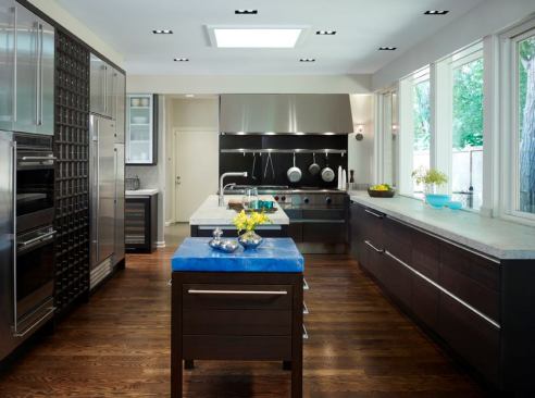 Mick de Giulio often layers multiple countertop materials in one space for a dramatic&nbsp;(and useful) effect.