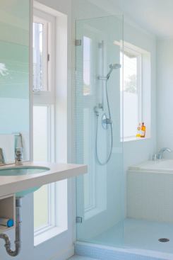 The master bath continues the pale palette selected to reflect as much sunlight around the hosue as possible.