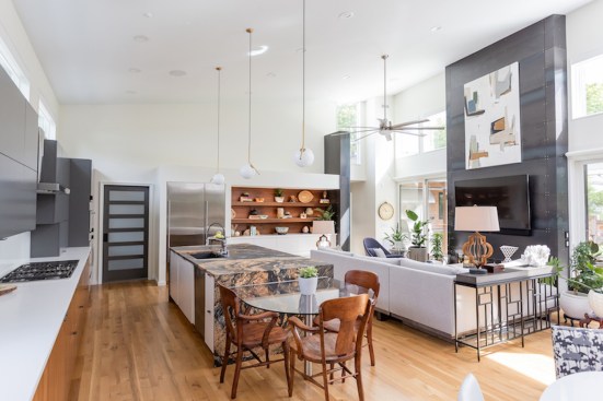 The living/dining/kitchen area -- the open heart of the house.