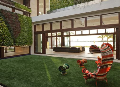 In addition to the private courtyards, the home features&nbsp;three “green walls” covered with over 17,000 tropical salt-tolerant plants.