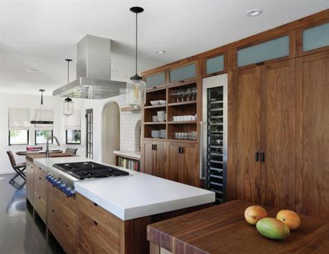 The+kitchen+is+in+a+remodeled+home%2c+and+the+room%27s+footprint+was+narrow.+Designer+TRG+Architects+specced+a+slim%2c+30-inch+wide+kitchen+island+with+plenty+of+storage+and+a+rolling+worktable+at+one+end.