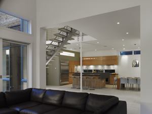 The open relationship between the living room and kitchen is conducive to social gatherings.