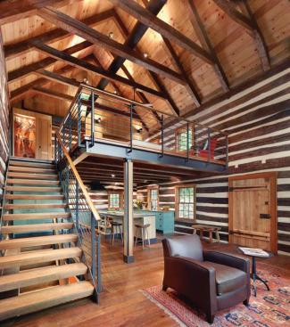 The remaining second level of the 1840 cabin overlooks the homes main living space.