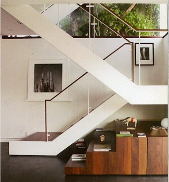 Juxtaposed against the exteriors, the interiors are light and bright with ipe wood floors and white-painted gypsum walls