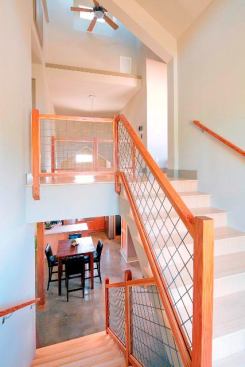 A reflective light well over the staircase&nbsp;brings abundant light into the interiors and automatic light switches help save energy.