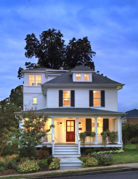 A 1910 four square got new life when a three-story tower addition was added to its left side.