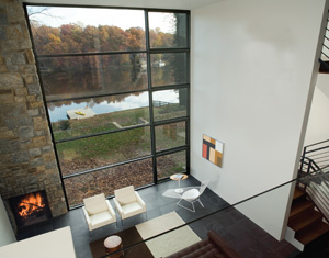 A vertical glass slot borders the chimney, letting extra daylight into the space