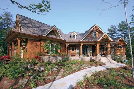 9. Home in the Woods:&nbsp;Wrapping porches and generous windows provide ample opportunities for calming views in this 3,126-square-foot rancher with craftsman detailing. Inside, find modern warmth in the large lodge room complete with fireplace and window wall. Multiple vaulted ceilings, a deluxe master suite, and an optional apartment over the garage add real luxury. For more images and information, click 
here.&nbsp;