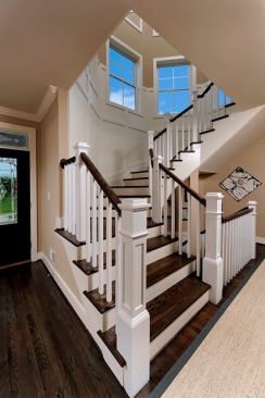 The main staircase leads up to the corner turret and features oak treads.