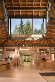 The great room monitor funnels in gentle northern light. Many of the houses furnishings are built-in or were designed and fabricated for this project.