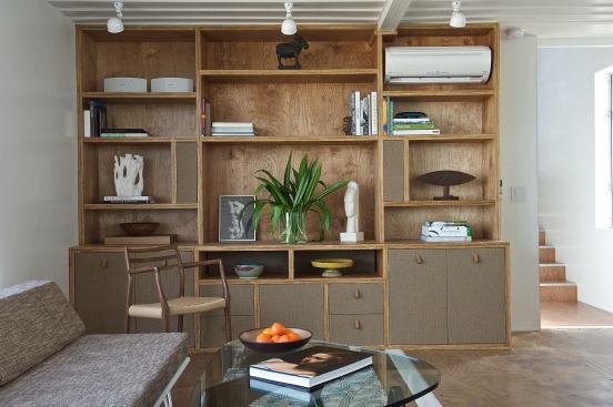 Built-ins&nbsp;offer a place for storage&nbsp;in the living room.