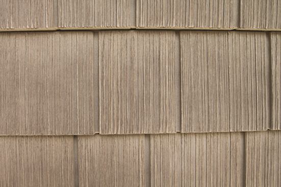 Cedar Shake&nbsp;The Weathered collection features random grooves and deep textures cast from molds made of real cedar. The vinyl shakes present a darker shade in the grain and a lighter on the higher points, creating a deeper contrast between light and shadow to give the authentic appearance of hand-split cedar. The weathered color palette (shown) consists of 15 colors. The Foundry is a division of &nbsp;The Tapco Group. &nbsp; 
www.foundrysiding.com