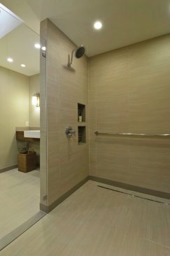 Grab+bars+are+set+throughout+the+bathroom.+