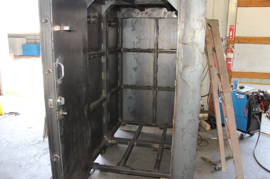 A Twister Safe under construction at the company’s facility south of Joplin, showing the reinforcing steel ribs in the &frac14;-inch steel plate box walls. Operating and construction details of the steel reinforced door and its five-point closing and locking mechanism are proprietary.