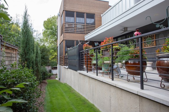 Patio along one side of the house.