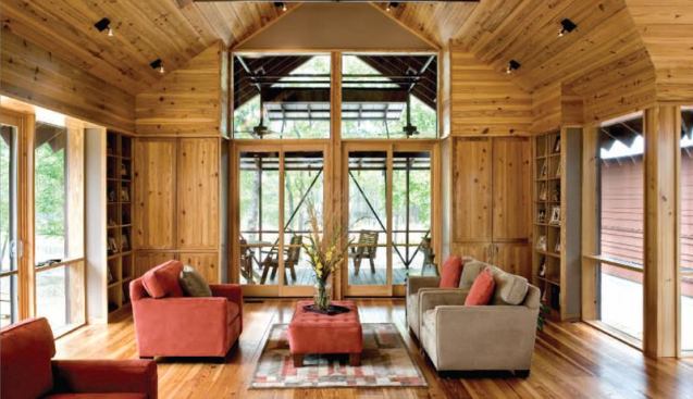 Operable windows and high ceilings encourage natural ventilation in the main living area.
