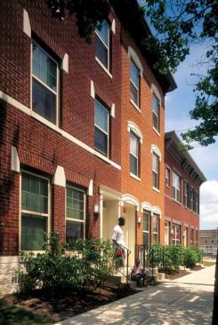 The architects combined the buildings' main facade ingredients-brick, mortar, aluminum trim, and urethane detailing-in different patterns and color combinations to echo the variety of the existing streetscape. For more information on this project,
click here.