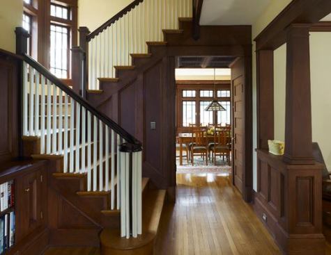 View of dining room from entry hall. The home required major structural and finish work, including all-new plumbing and electricial and the custom-milling of period interior natural oak trim.