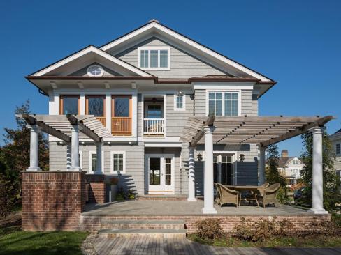 The pergola on the home's south elevation is made of cedar, and wisteria has been planted. 