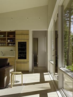 Built-in cabinetry, doors, and windows all meet an 8-foot-high datum throughout the house, providing a sense of consistency and order.