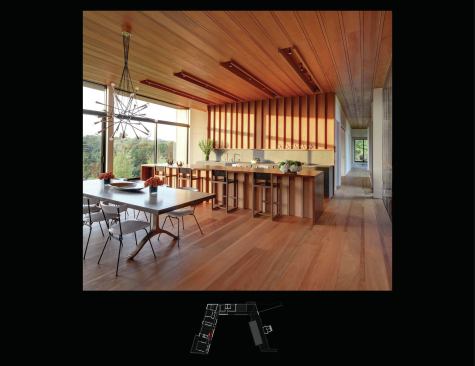 The mahogany decking consists of 1 &frac12;-inch-square timbers flanking 9 &frac12;-inch boards, a pattern the architects abstracted throughout the house. In the kitchen, for example, the ceiling boards drop out to create a trough for light fixtures. “You’re not just punching holes all over the place to put in these things that need a home, but integrating them into the system,” Masi says.