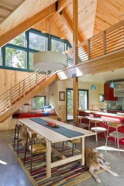 The+double-height%2c+sunny+great+room+includes+a+dining+area+and+a+second+floor+that%27s+open+to+the+rest+of+the+house.