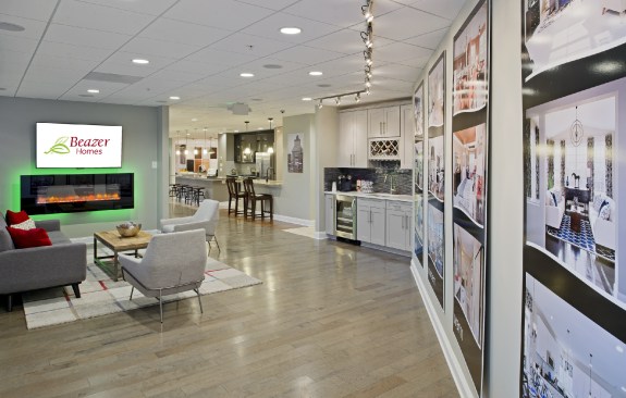 In this Beazer Homes design center, designed by Success Strategies, buyers are given a comfortable place to relax and discuss different options they've seen in the studio.