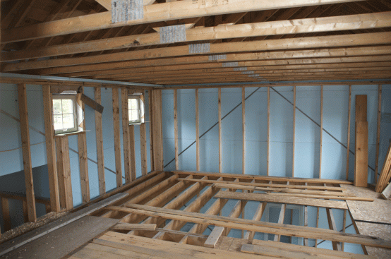 2-inch extruded polystyrene blue board, shown here on the second floor, runs continuously around the
slab up the walls to the roof.