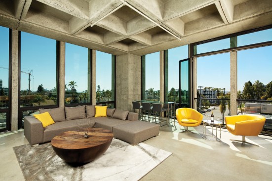 Structure Lofts: They converted a classic mid-century office building into lofts and kept all of the structures exposed, including the concrete ceilings. As a consequence, they captured all of this height in the coffers and it has a loft feel throughout, but it's not too industrial.