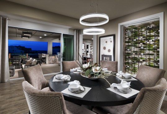 For TRI Pointe, glass walls that allow homeowners to open rooms up to the outside are a huge hit with buyers.