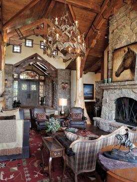 This rustic, Western-style home draws 75 percent of its heat from a geothermal system. Its six cedar-trunk columns were sourced as standing trees, excavated, and delivered to the site with root balls intact (opposite and above).