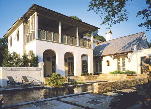 Both the more public arcaded veranda and the private covered porch above it provide shade for interior spaces and for outdoor enjoyment.