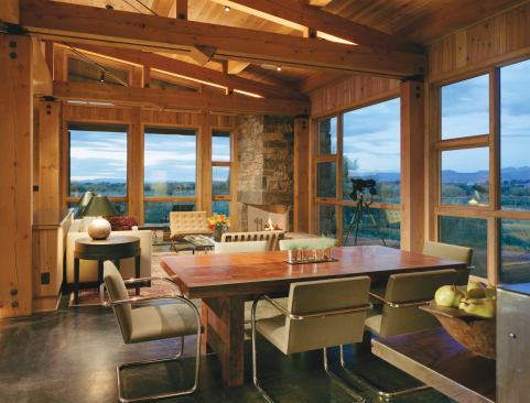 Exposed trusses serve to keep the scale of the main living spaces from feeling overwhelming.