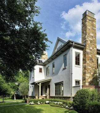 Architect Leslie Barry Davidson, drew from the homes of southern Louisiana to design a roof system with witch's hat gables and a hipped roof at the perimeter.