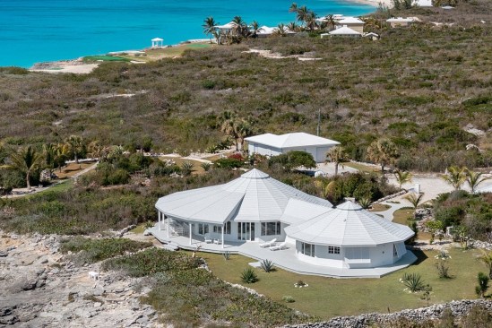 Designed to last 100 years, Deltec Homes’ panoramic coastal residences, like this one in San Salvador Island, Bahamas,  are engineered to regularly withstand hurricane force winds of 200 mph.