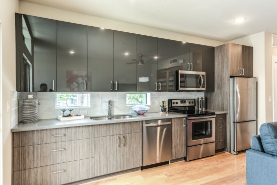 Surge Homes imports cabinet finishes from Germany for the interiors at The Parc at Midtown. 