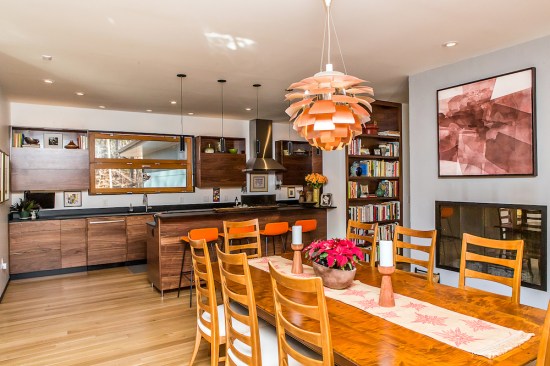 The open floor plan revolves around the kitchen — the heart of the house, both physically and metaphorically — with all other spaces having easy access to it. 
