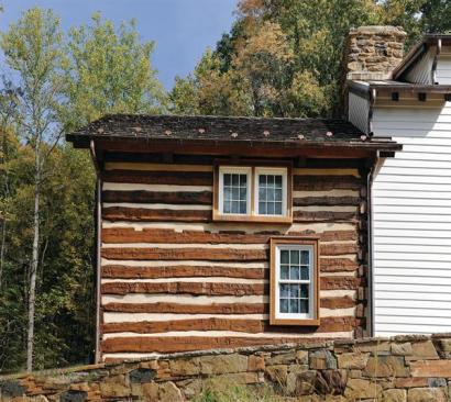 A close-up of the 1794 cabin, where the logs were carefully preserved and re-chinked