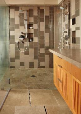 With its new gabled fir ceiling, cherry cabinets, and limestone floors and countertop, the bath plays off its natural setting. 