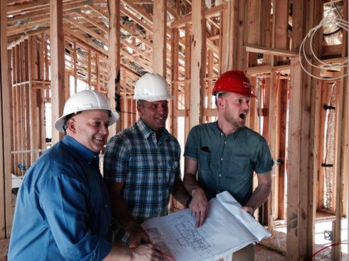 Responsive Home team members, TRI Pointe vp of purchasing Kevin Wilson, Pardee Las Vegas president Klif Andrews, and project creative director Bobby Berk enjoy a moment of vehement mirth during the frame-walk.
